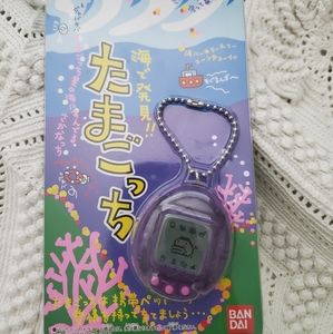 Purple/pink Tamagotchi Ocean